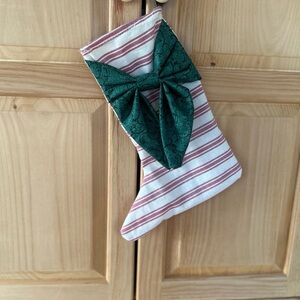 Striped Christmas Stocking with Green Bow